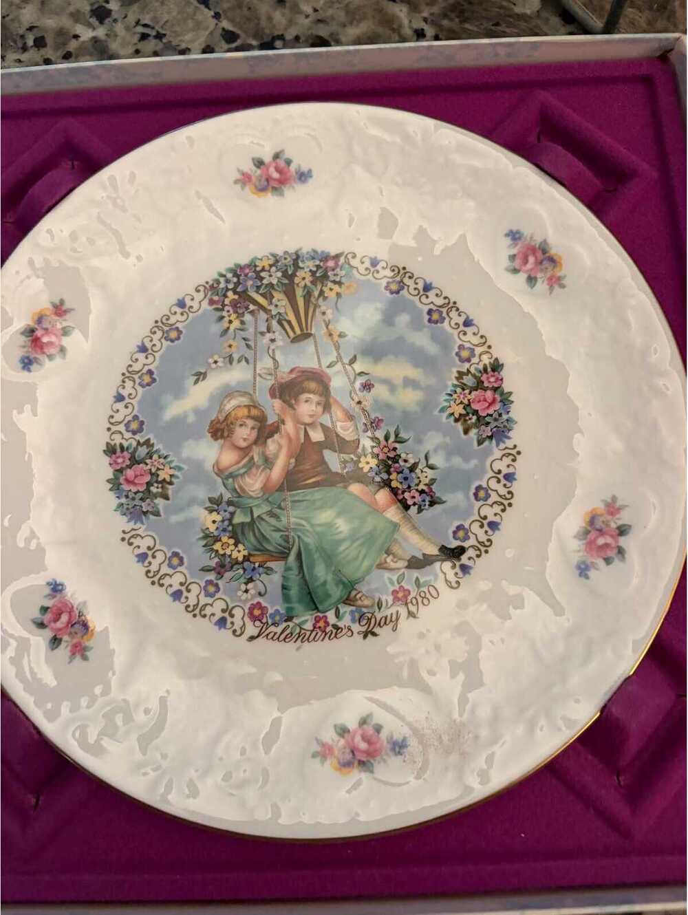 This is a 1980 Royal Doulton Valentine's Day porcelain collector plate.